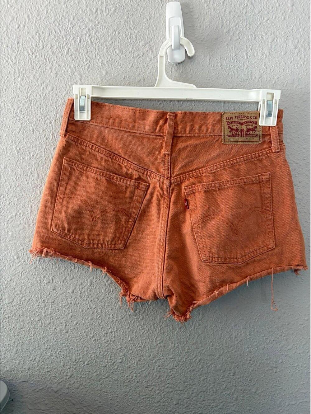 Levi's 501 orange shorts size W28. 2in inseam
